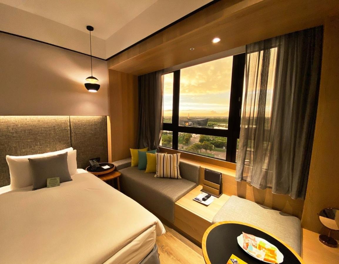 Evergreen Palace Hotel Chiayi Taibao Bagian luar foto A typical room at the hotel